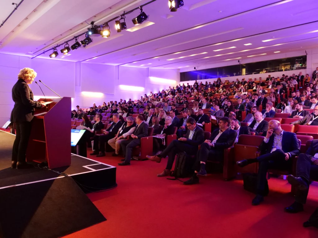 Stage presentation at the BIOKET conference with event lighting.